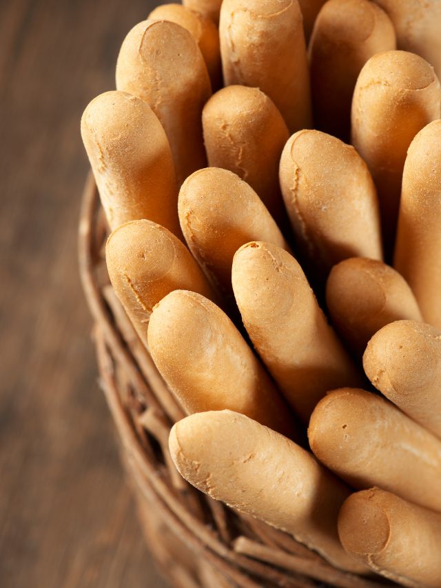 top view of breadsticks in a basket