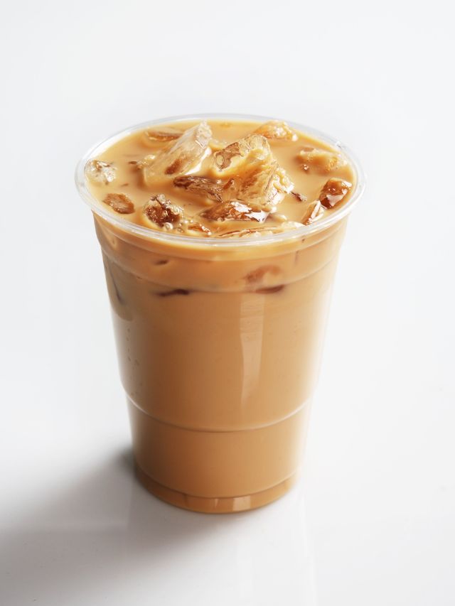 a cup of iced coffee filled with ice