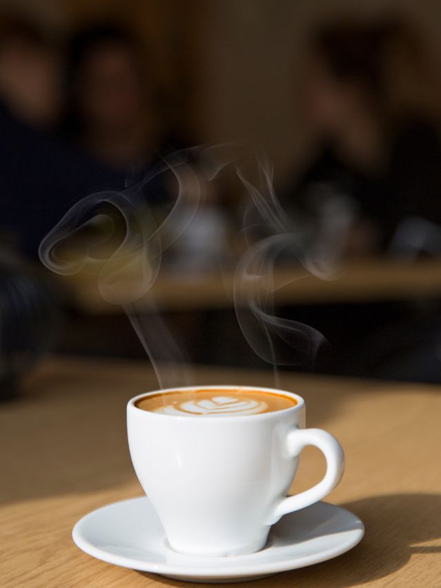 a single coffee mug with cappuccino in it