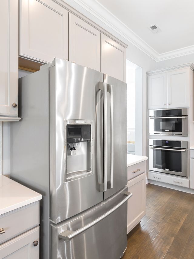 refrigerator in silver in kitchen