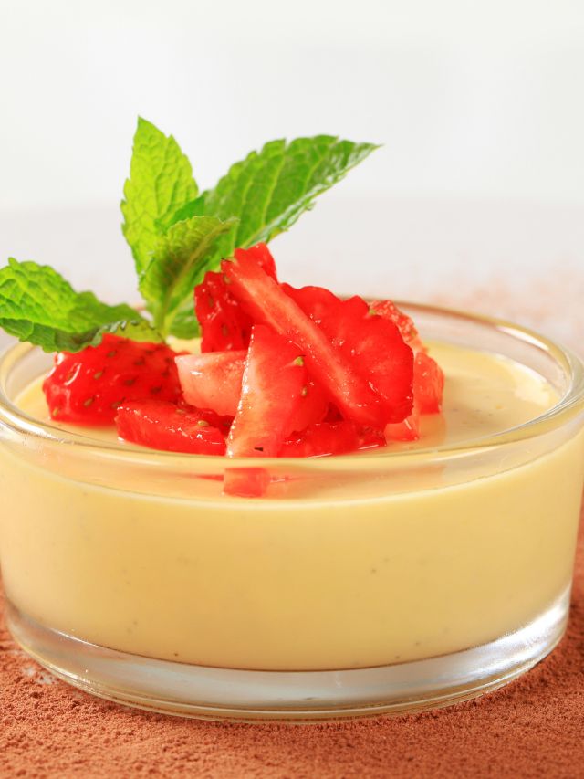 clear glass filled with custard and garnish with strawberries