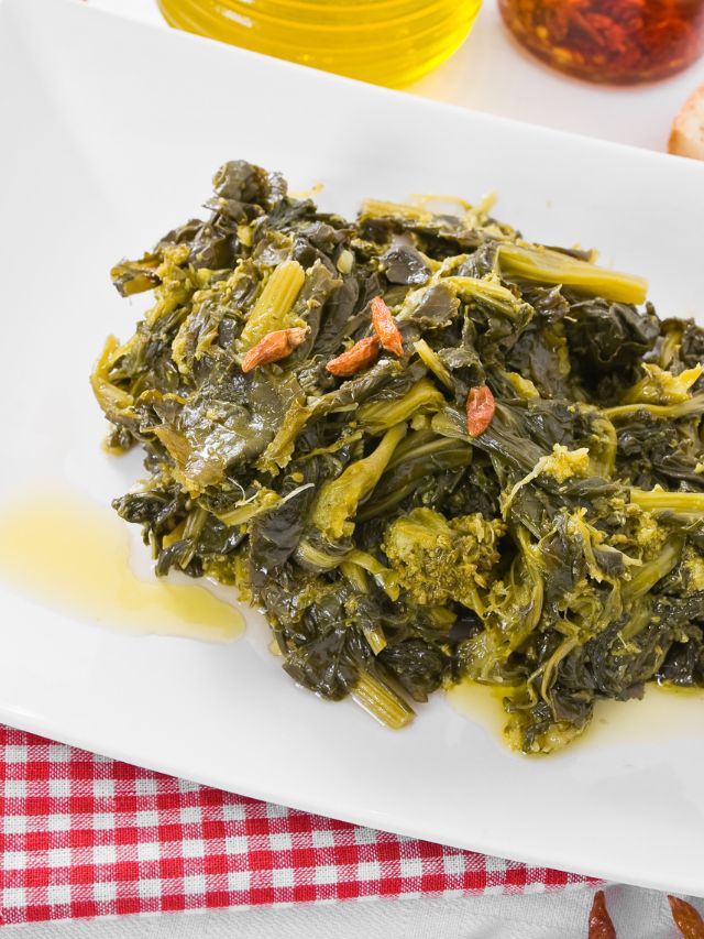 white plate filled with turnip greens