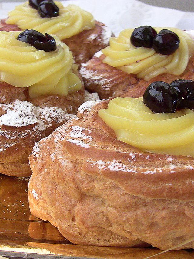 zeppole dessert with frosting and topping on top