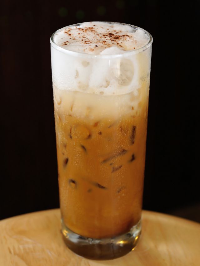 iced latte in tall glass with ice