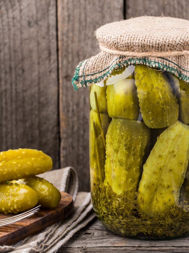 pickles in a jar and pickles on the side