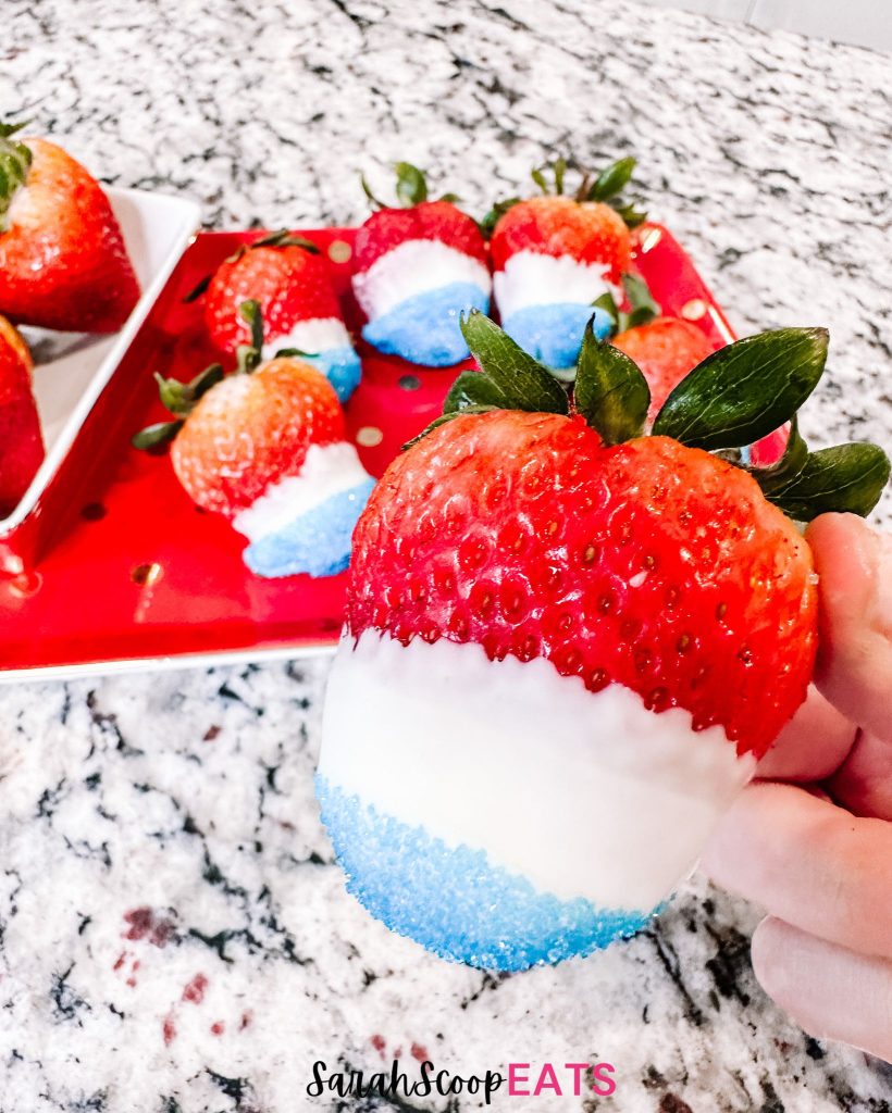 a red white and blue chocolate-covered strawberry 