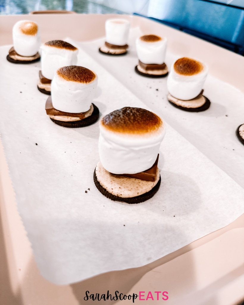 toasted marshmallows on  an oreo cookie with chocolate