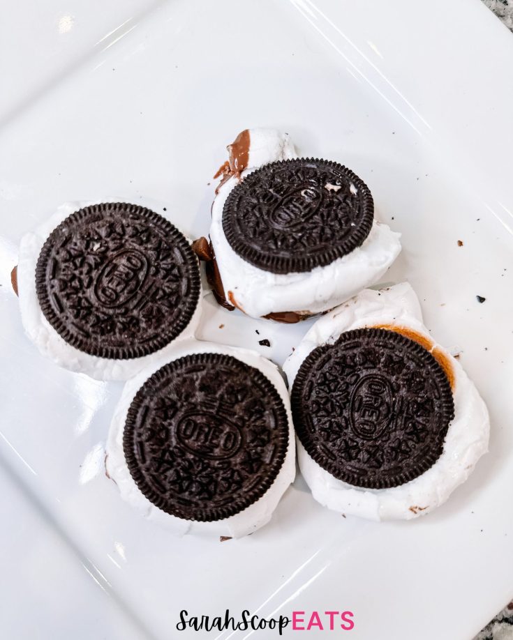 4 peanut butter oreo s'mores on a plate