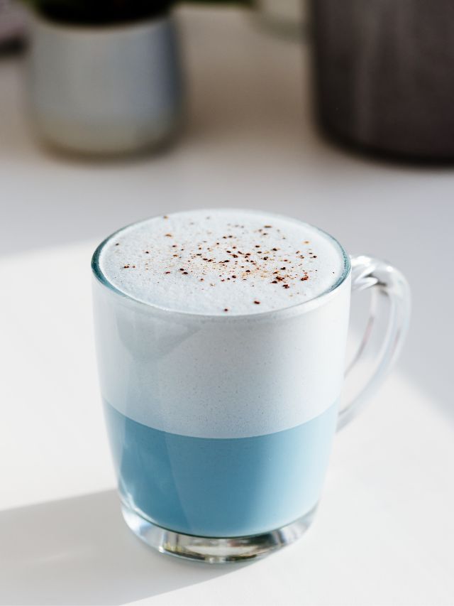 mug filled with blue latte and cinnamon