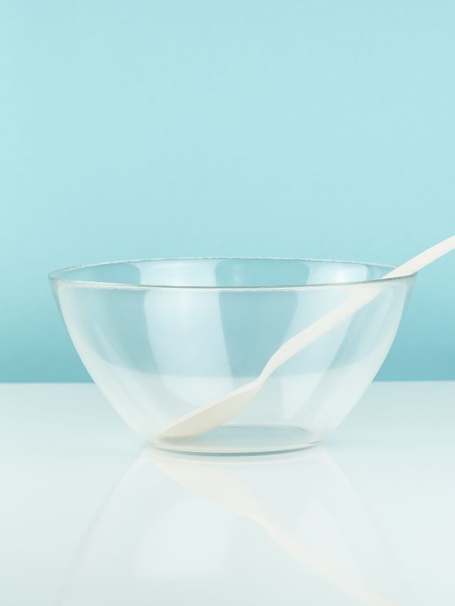 clear bowl with spoon in it