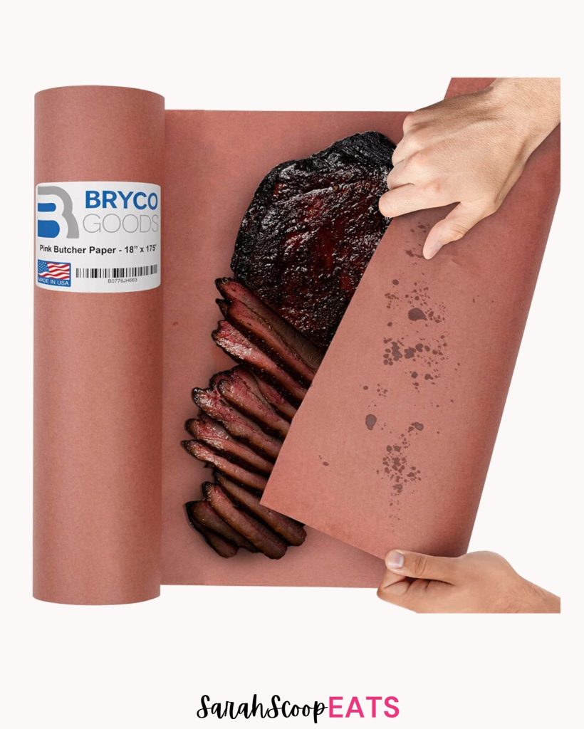 wrapping cooked meat with pink paper