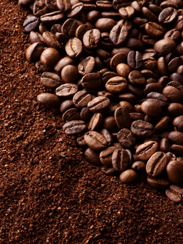 coffee beans and ground coffee next to each other
