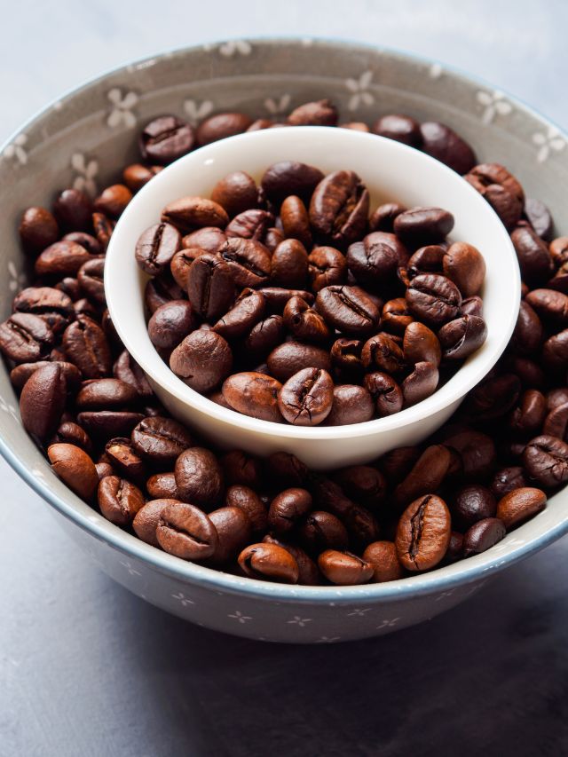 whole coffee beans in bowls