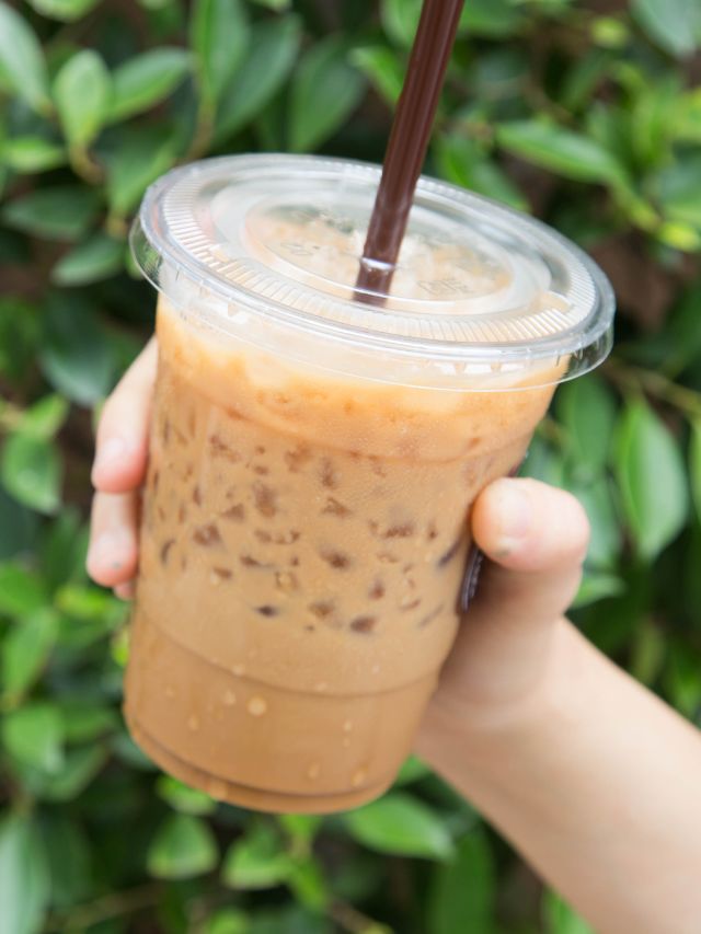 iced coffee in cup with straw
