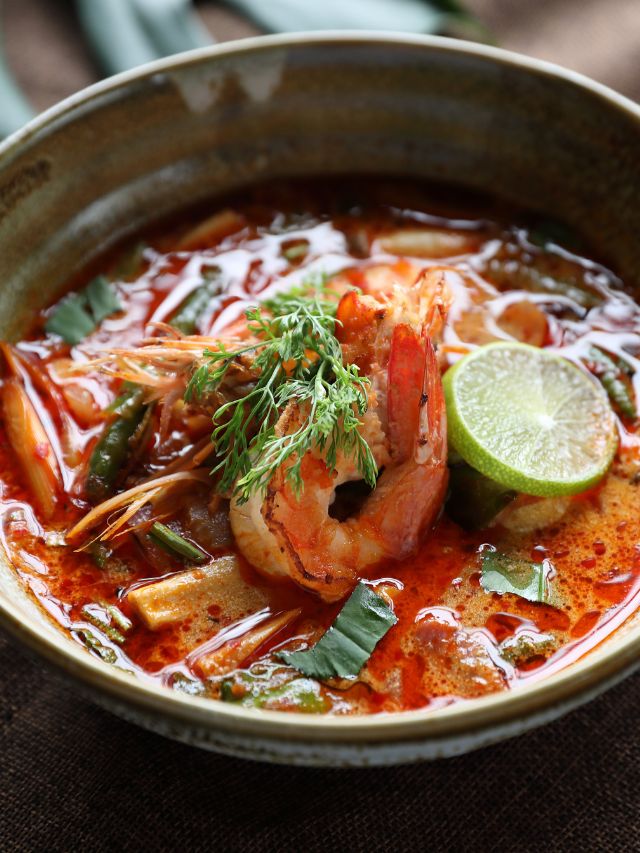 soup with shrimp and lime in a bowl