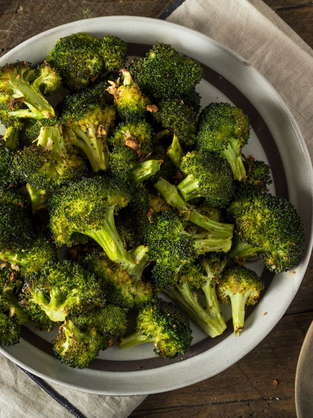 a pot of cooked broccoli