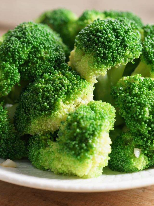 fresh washed broccoli on plate