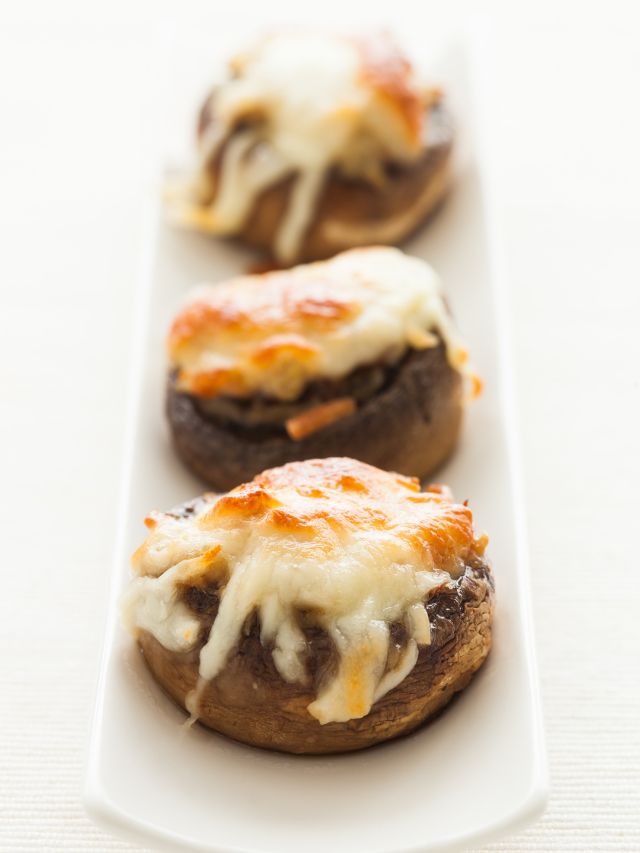 3 mushrooms stuffed and topped with melted cheese