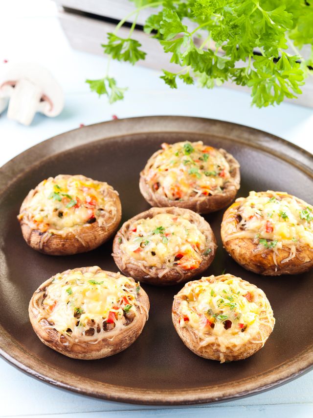 platter of stuffed mushrooms with toppings
