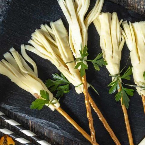 Halloween Cheese and Pretzel Broomsticks