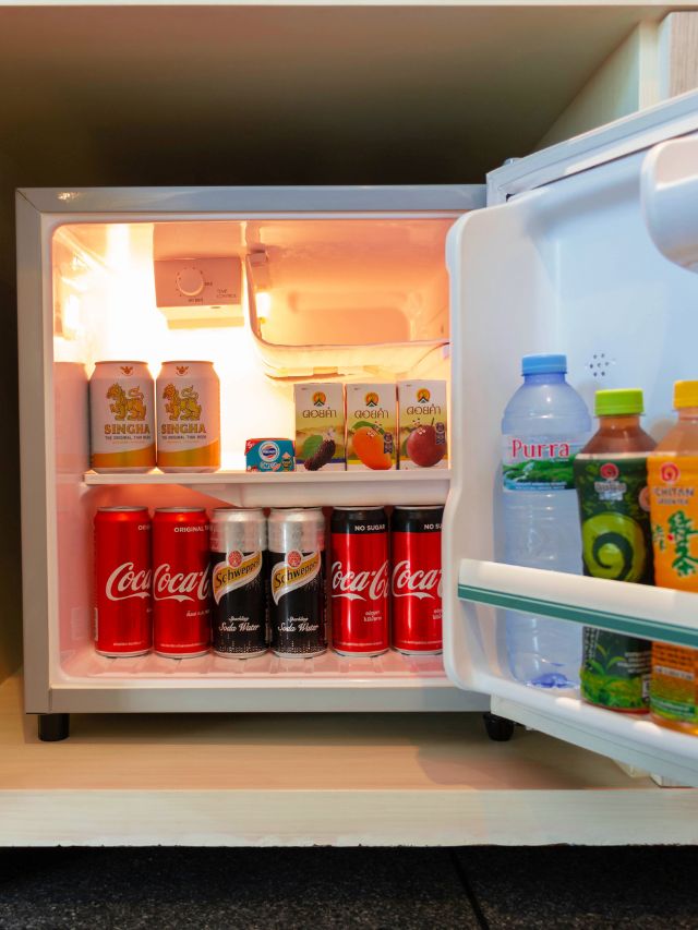 A refrigerator with a lot of drinks in it.