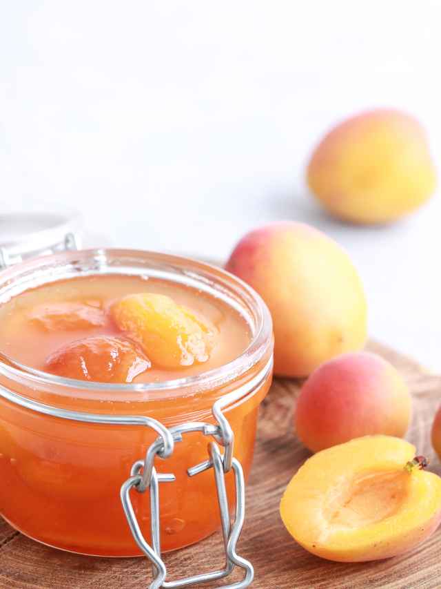 apricots by a jar of preserves