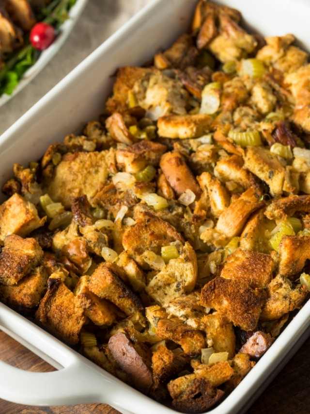 Thanksgiving stuffing in a white dish.