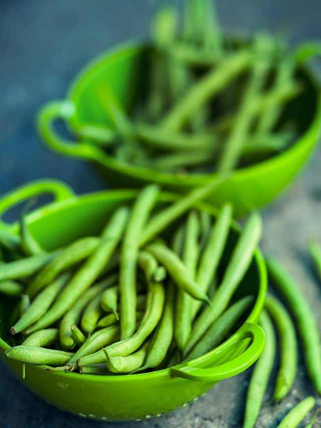 Green beans in green bowls.