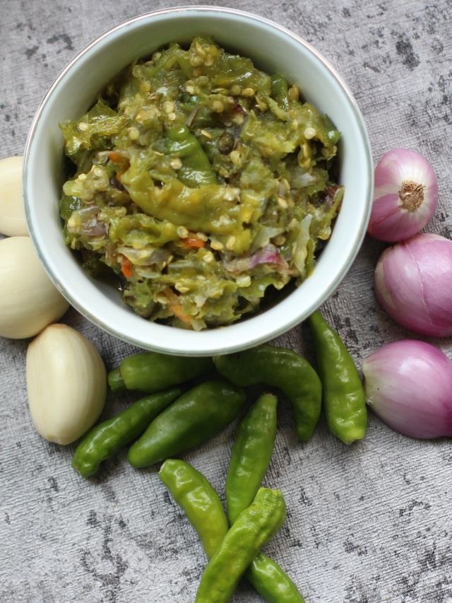 A bowl of green chilies, onions and peppers, perfect for making a spicy Thai-style green chili sauce.