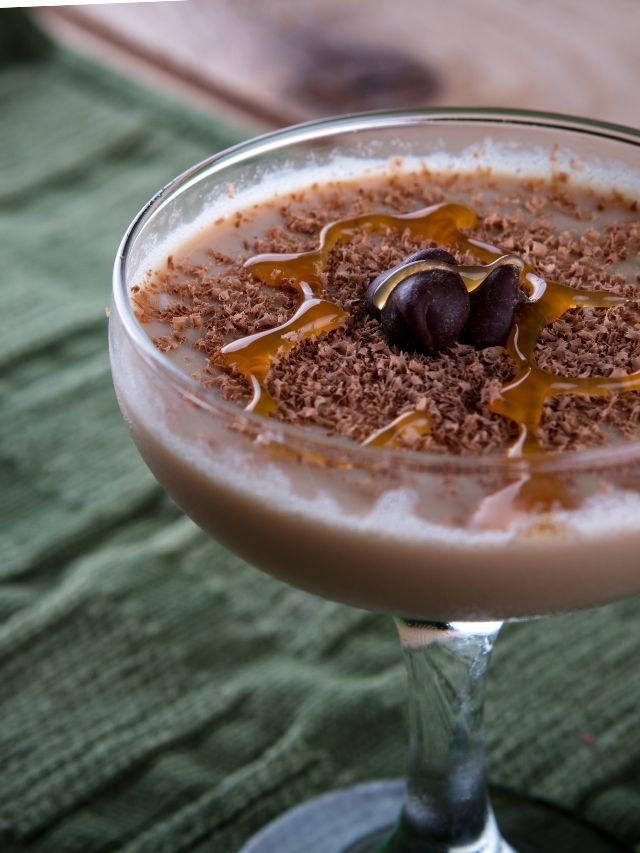 An indulgent drink with a rich combination of chocolate and caramel on top, perfect for satisfying your sweet cravings.