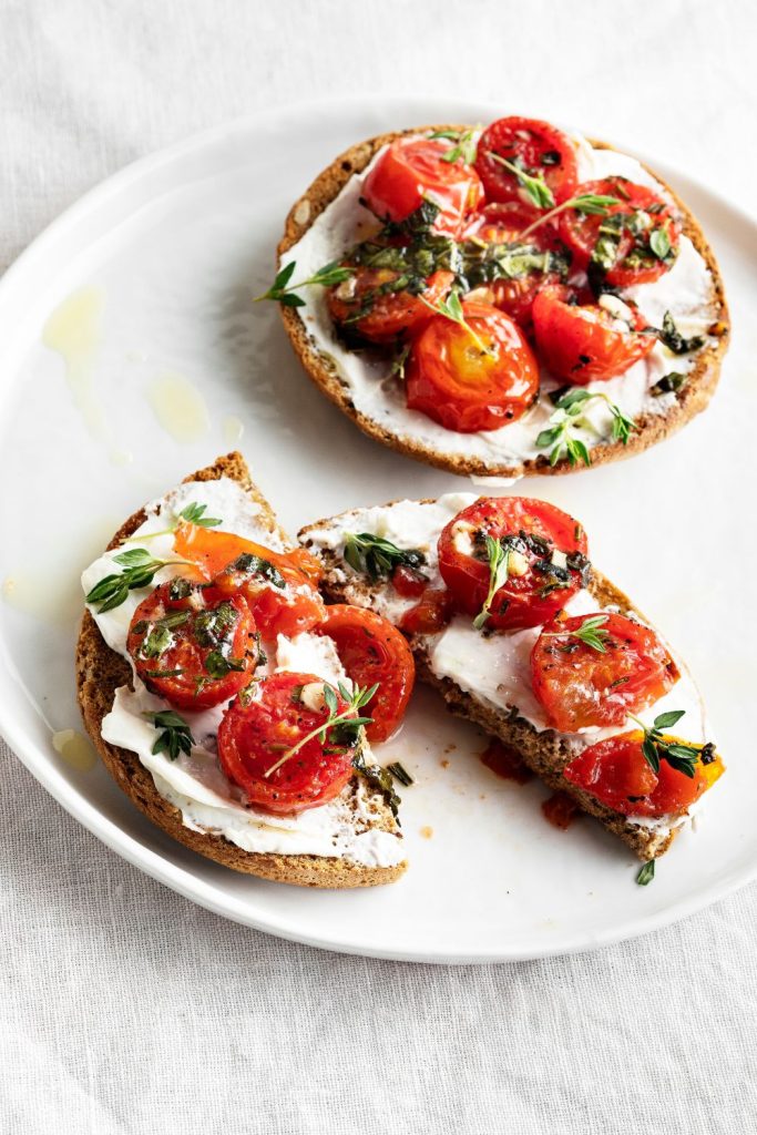 tomato and basil on cream cheese