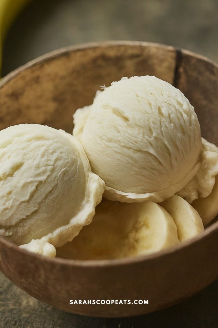 A wooden bowl containing three scoops of vanilla ice cream. The website "SARAHSSCOOPEATS.COM" is visible at the bottom of the image.